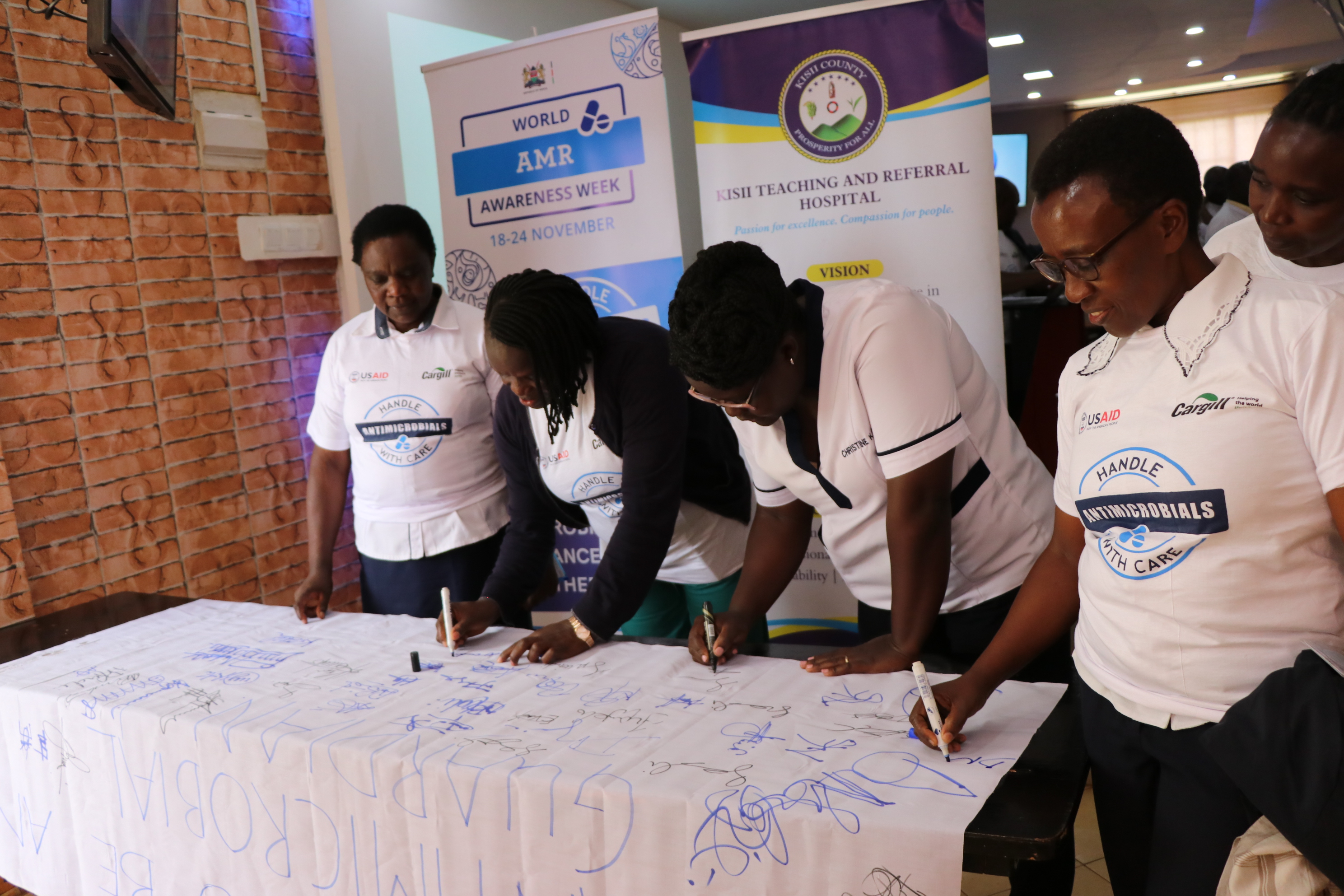 HCW Signing the Antimicrobial Pledge